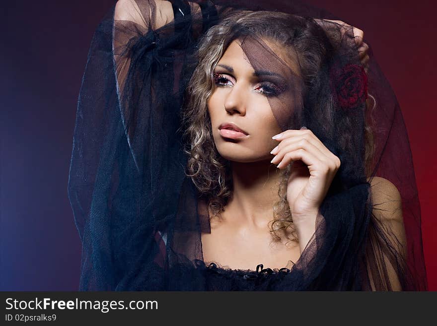 Beautiful woman with red rose