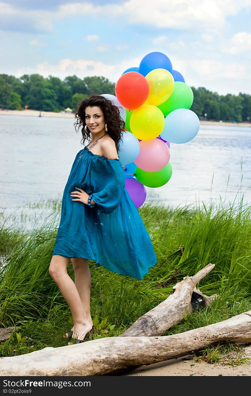 Happy woman with colorful balloons. Happy woman with colorful balloons