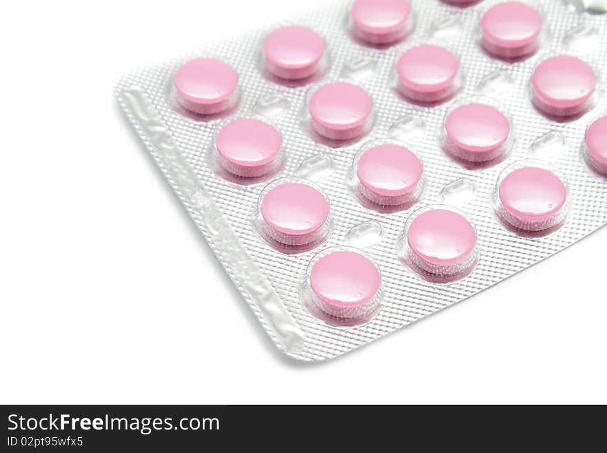 Pink Pills On White Background