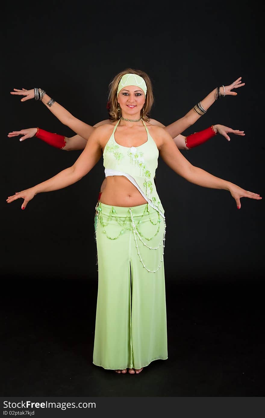 Group of three  women perfoming exotic belly dance. Group of three  women perfoming exotic belly dance