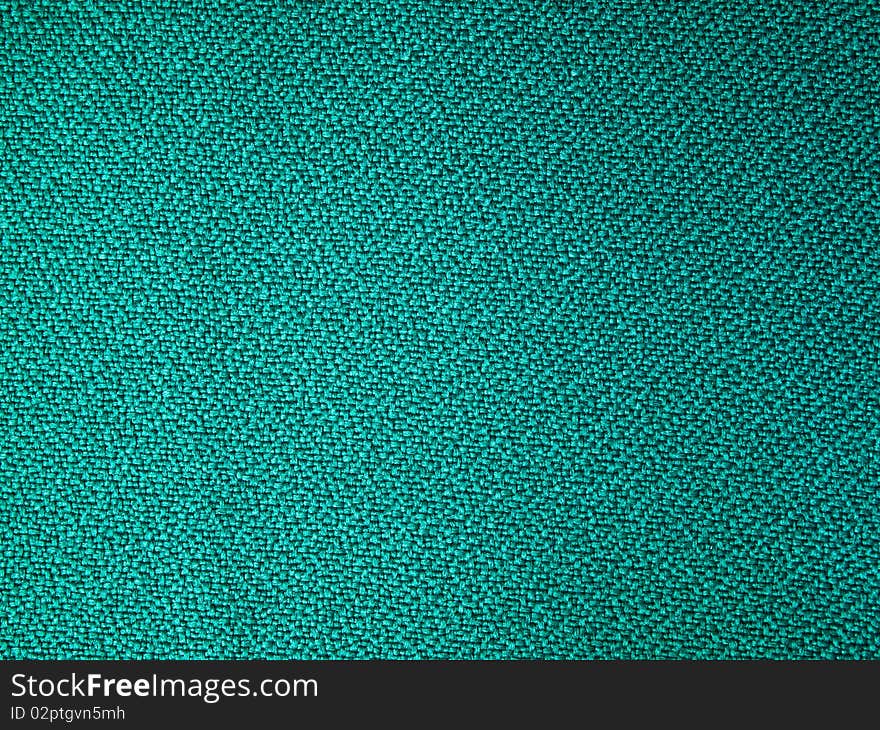 Green fabric texture sample background. Green fabric texture sample background