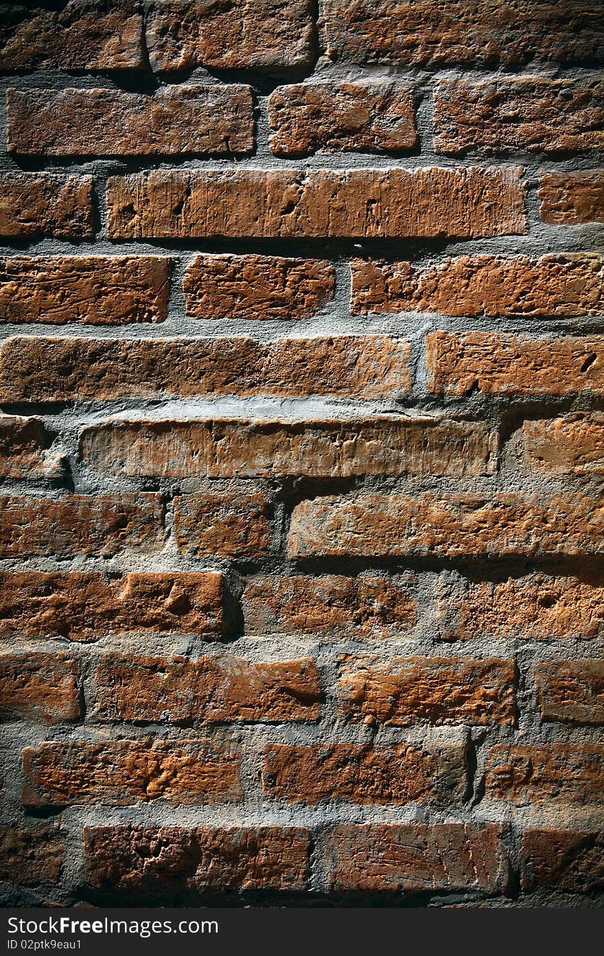 Grunge Brick Wall under light