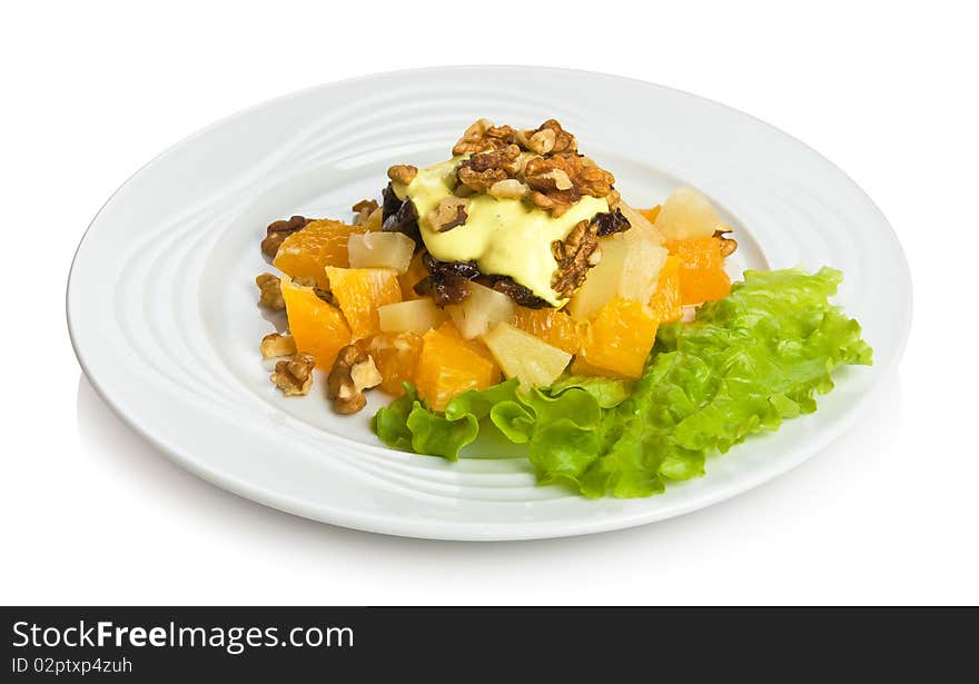 "Spring asylum" salad with fruits, nuts, honey, prunes and cognac.
Isolated on white by clipping path.