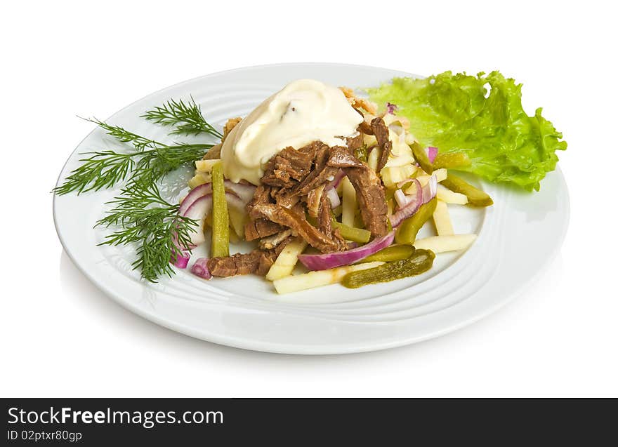 Hussar salad with beef, chicken and pickled cucumbers.
Isolated on white by clipping path.