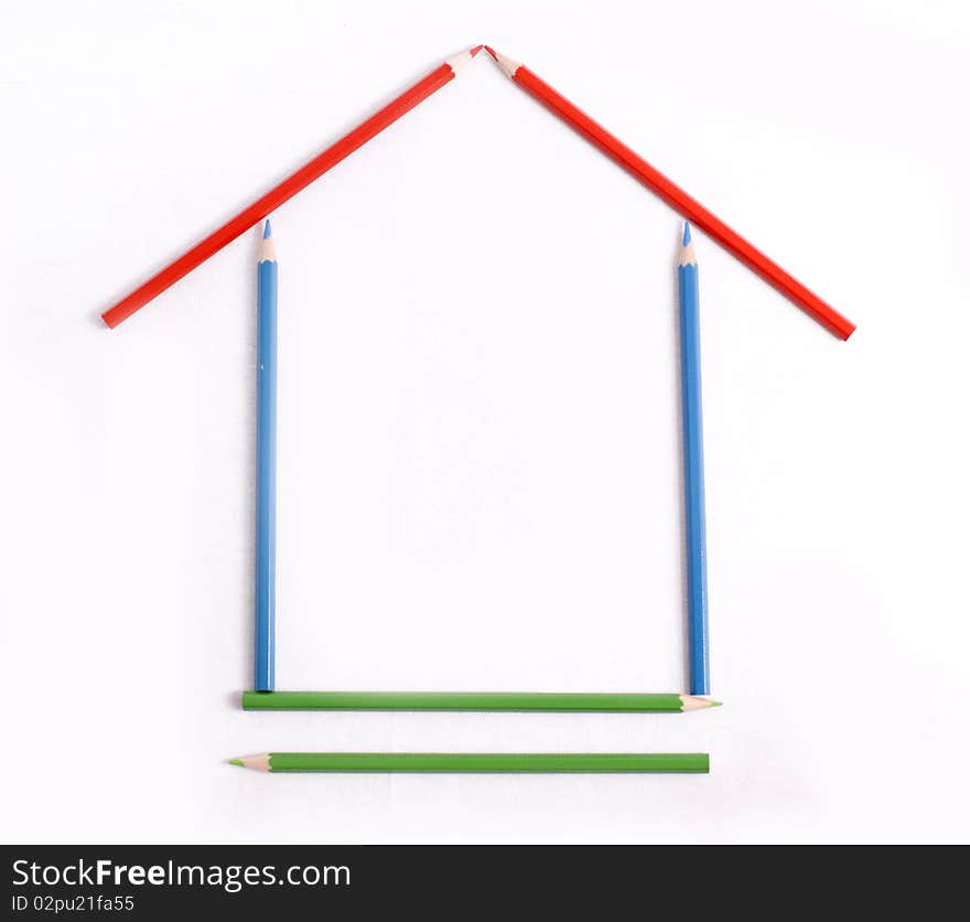 Close up shot of a set of pens forming a house