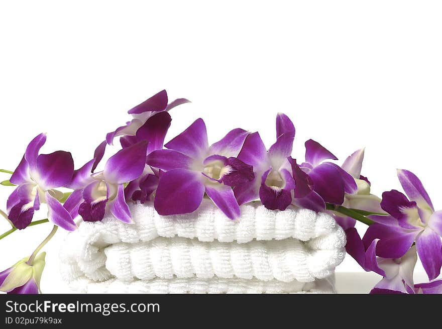 Branch orchid on a white towel. Branch orchid on a white towel