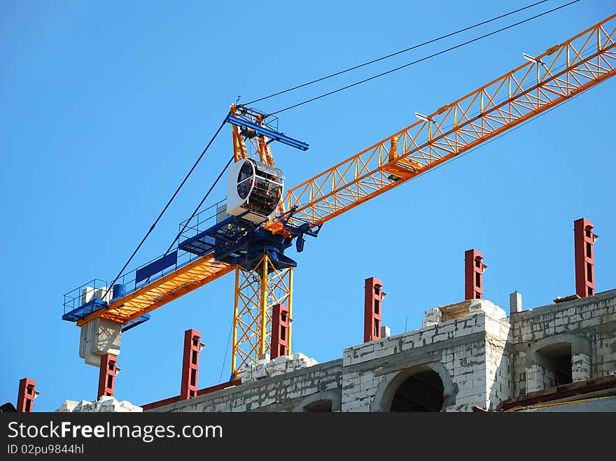 Building Crane And Not Complete Skyscraper