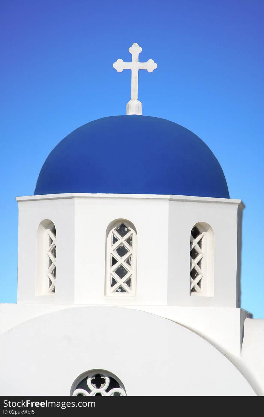 A detail of a church in santorini