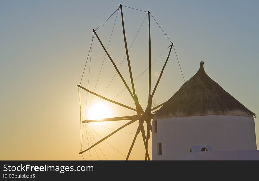 A windmill in a sunset