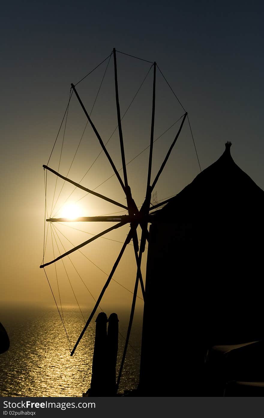 A windmill in a sunset