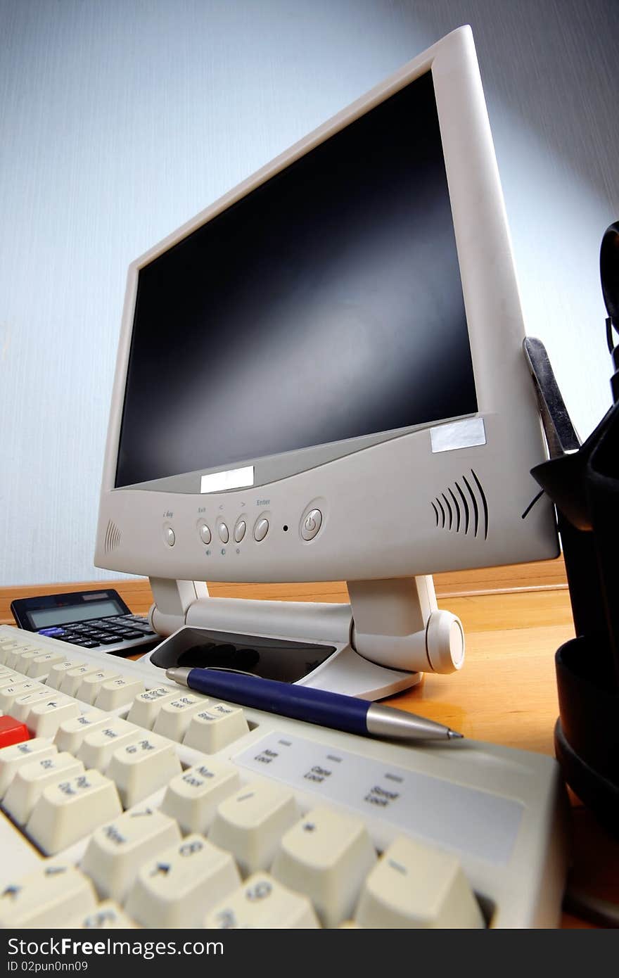 Classic work place - keyboard and monitor at table