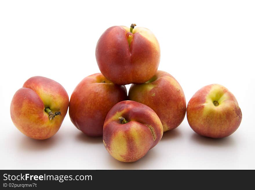 Refine nectarines onto white background