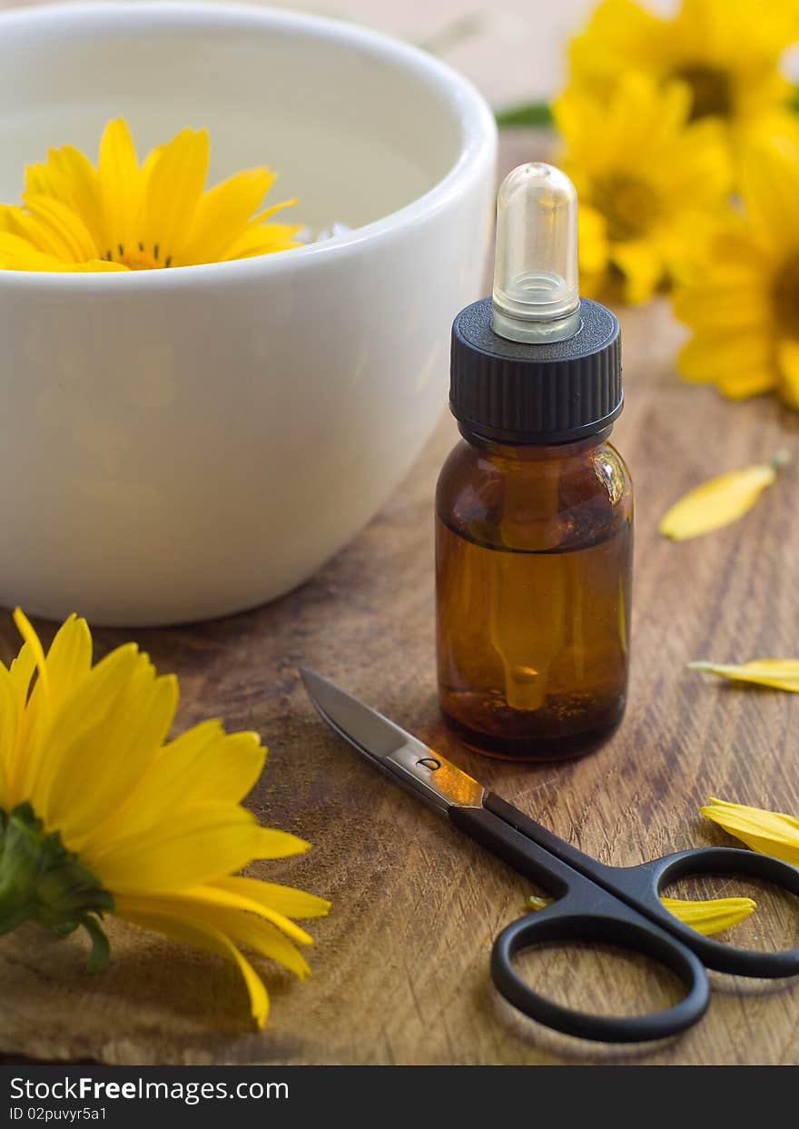 Massage oil for nail and manicure scissors. Lilac on background. Could be a generic toiletry. Massage oil for nail and manicure scissors. Lilac on background. Could be a generic toiletry.