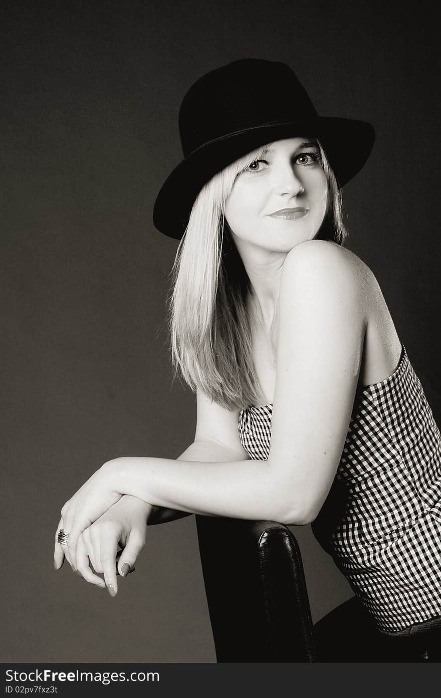 Provocative blonde woman with hat. Fashion art photo. Provocative blonde woman with hat. Fashion art photo