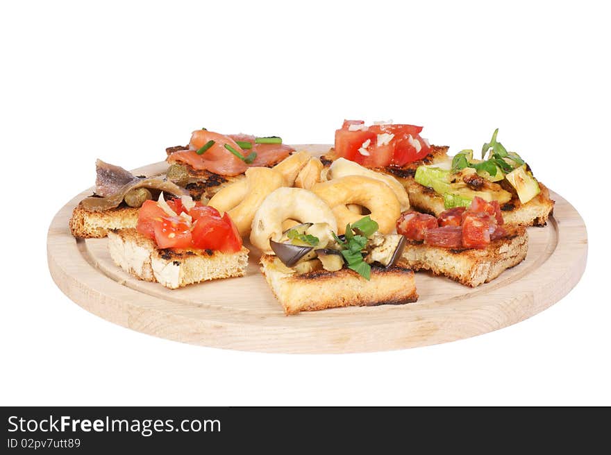 Italian bruschetta and taralli over cutting board