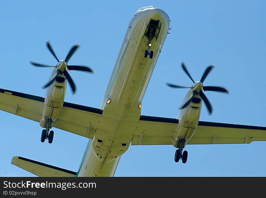 Airplane flying over blue sky