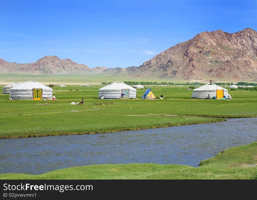 Traditional mongolian yurts in beautiful valley. Traditional mongolian yurts in beautiful valley