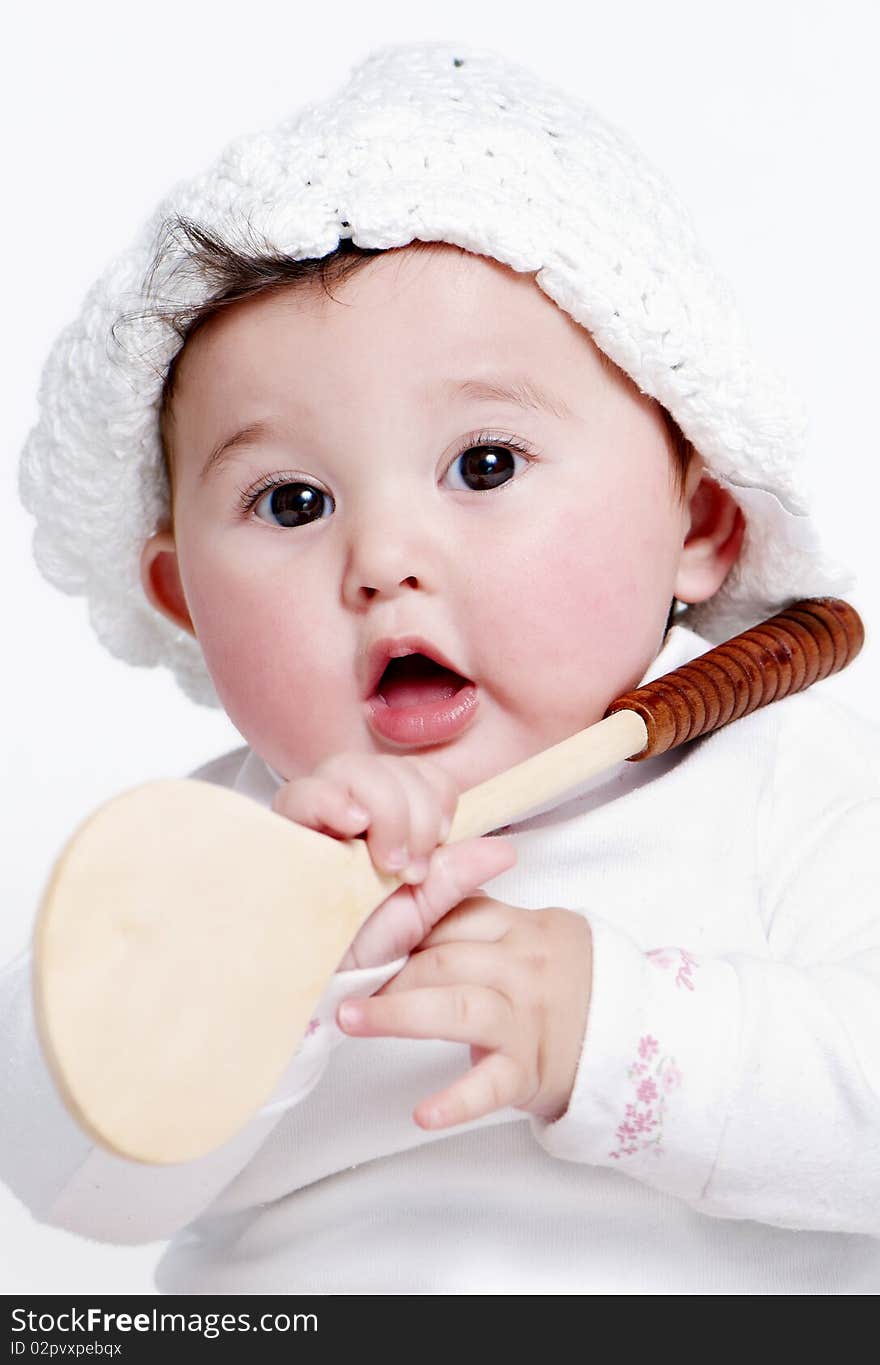 Little girl a on white background. Portrait