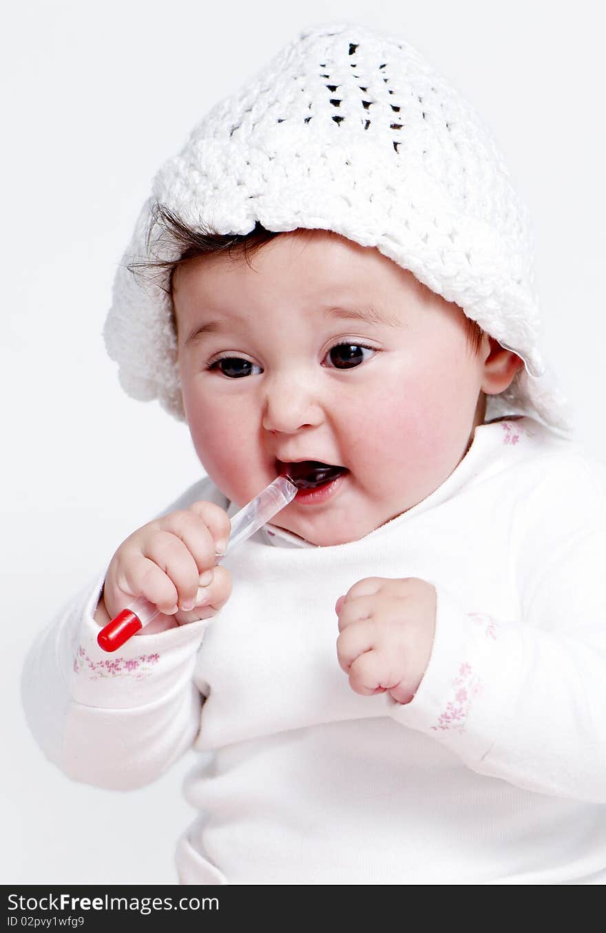 Little girl a on white background. Portrait