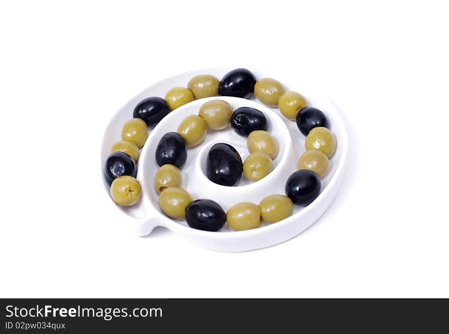 Olives on a plate isolated on a white background