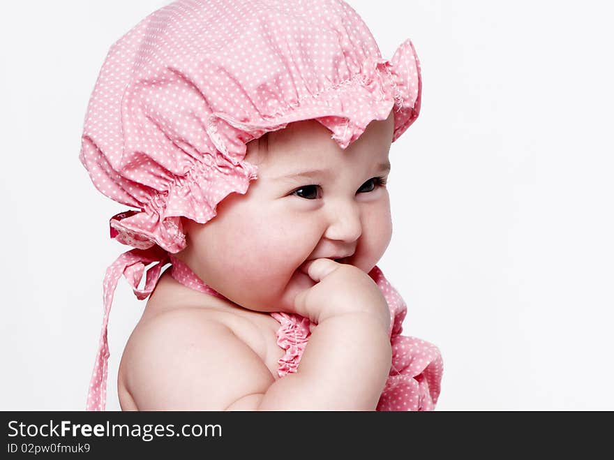 Little girl a on white background. Portrait