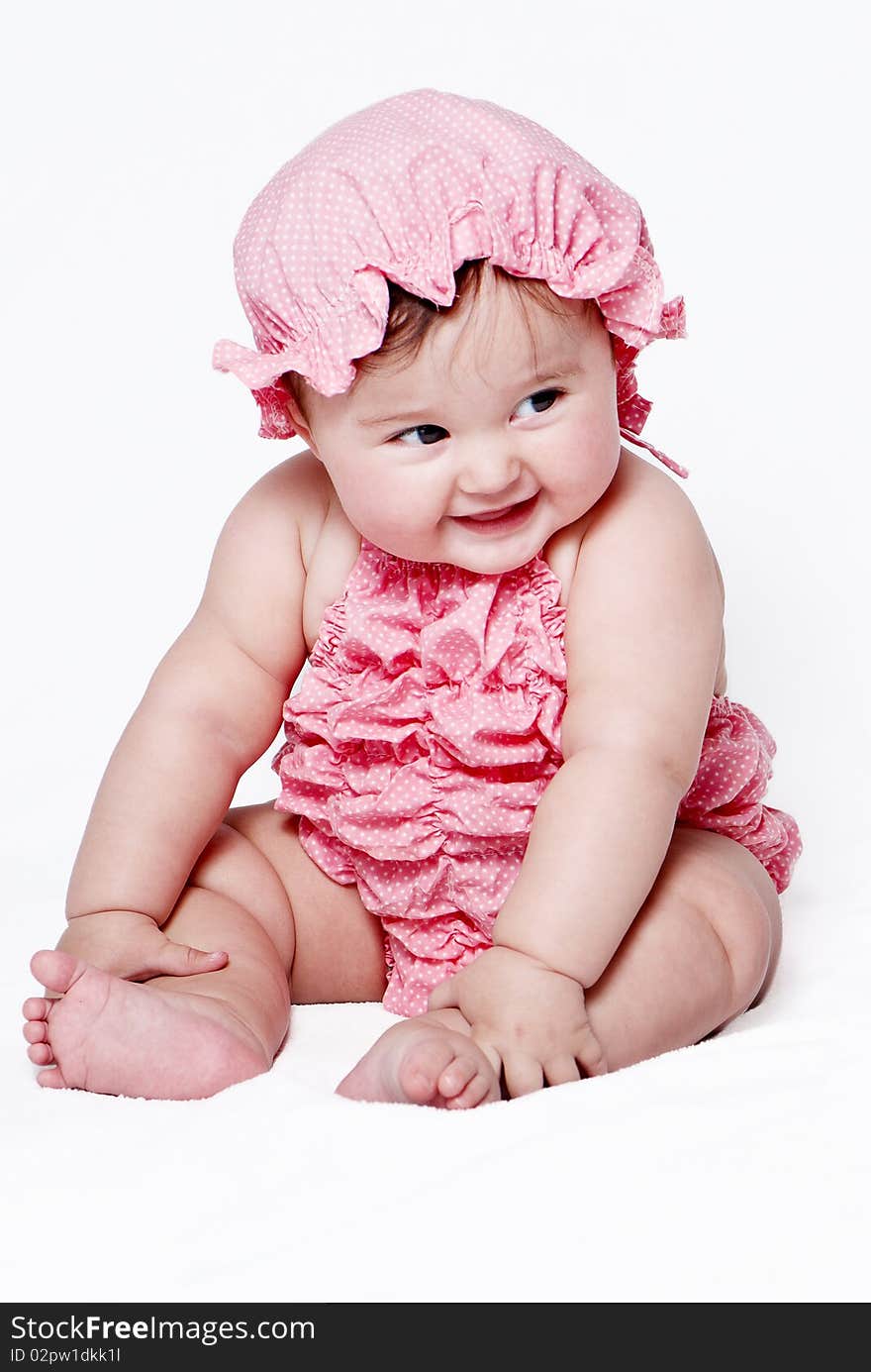 Little girl a on white background. Portrait