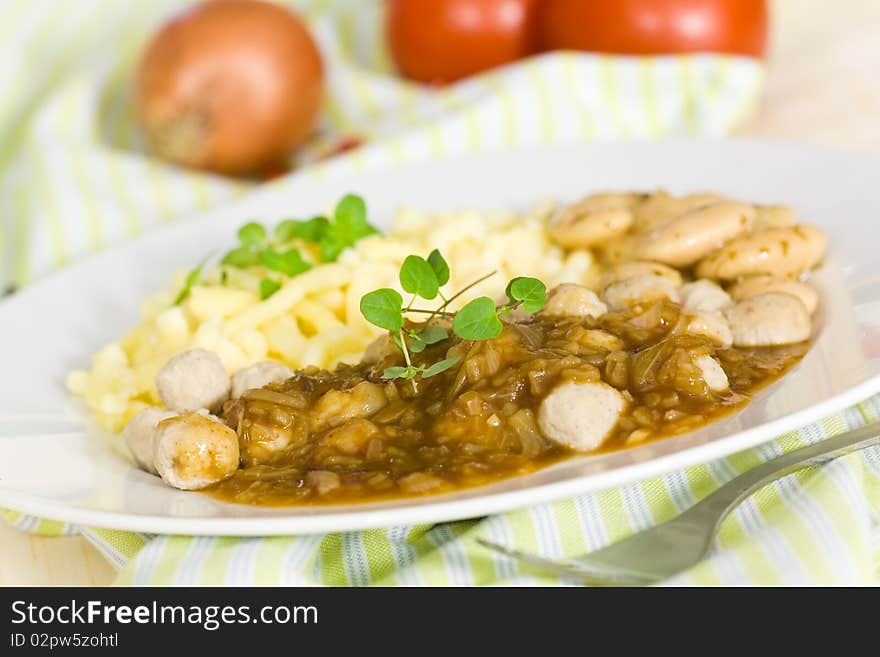 Fresh Meat Balls of Poultry with onion sauce,salad .