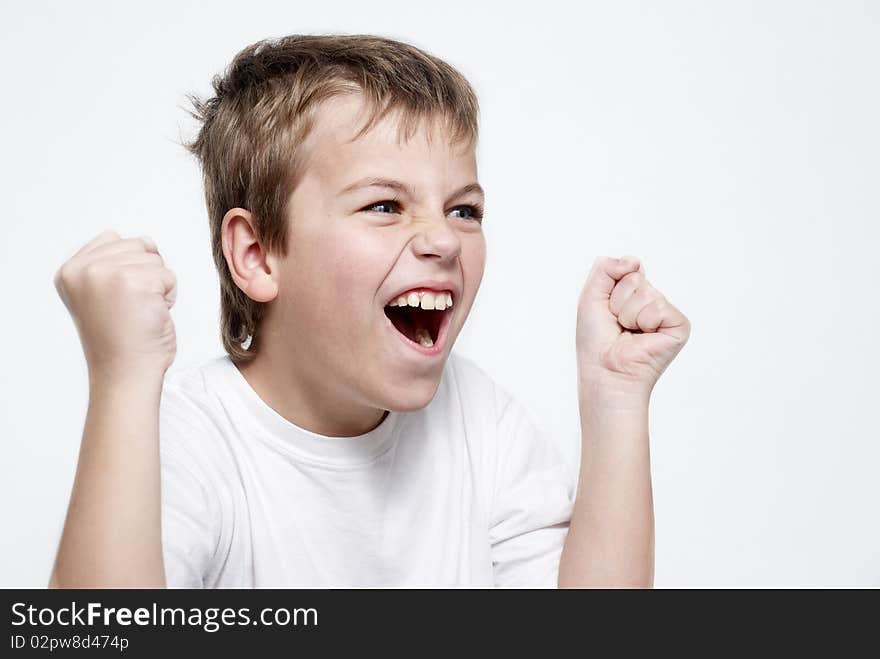 Happy boy football fan on light background