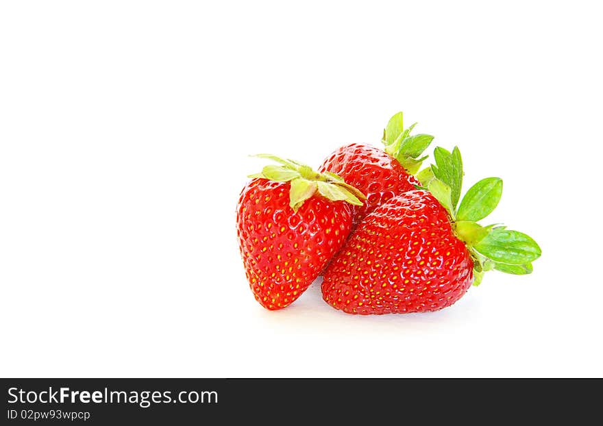 Strawberries isolated over white background