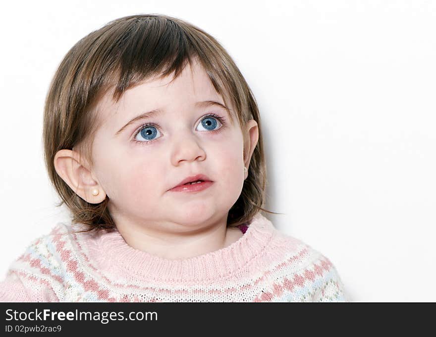 Little girl a on white background. Portrait