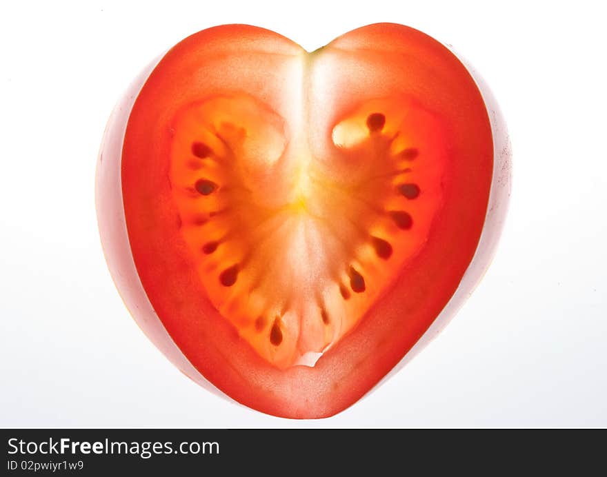 Beautiful tomato in heart shape. Beautiful tomato in heart shape.