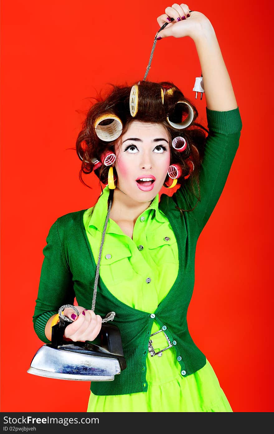 Shot of a funny  woman housewife dressed in retro style. Shot of a funny  woman housewife dressed in retro style.