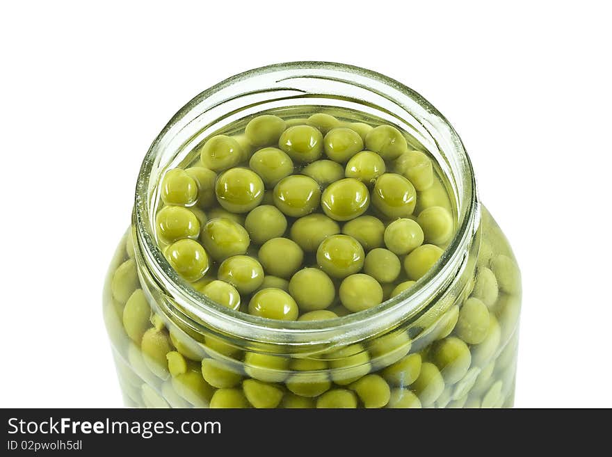 Pea beans in the opened glass jar. Pea beans in the opened glass jar