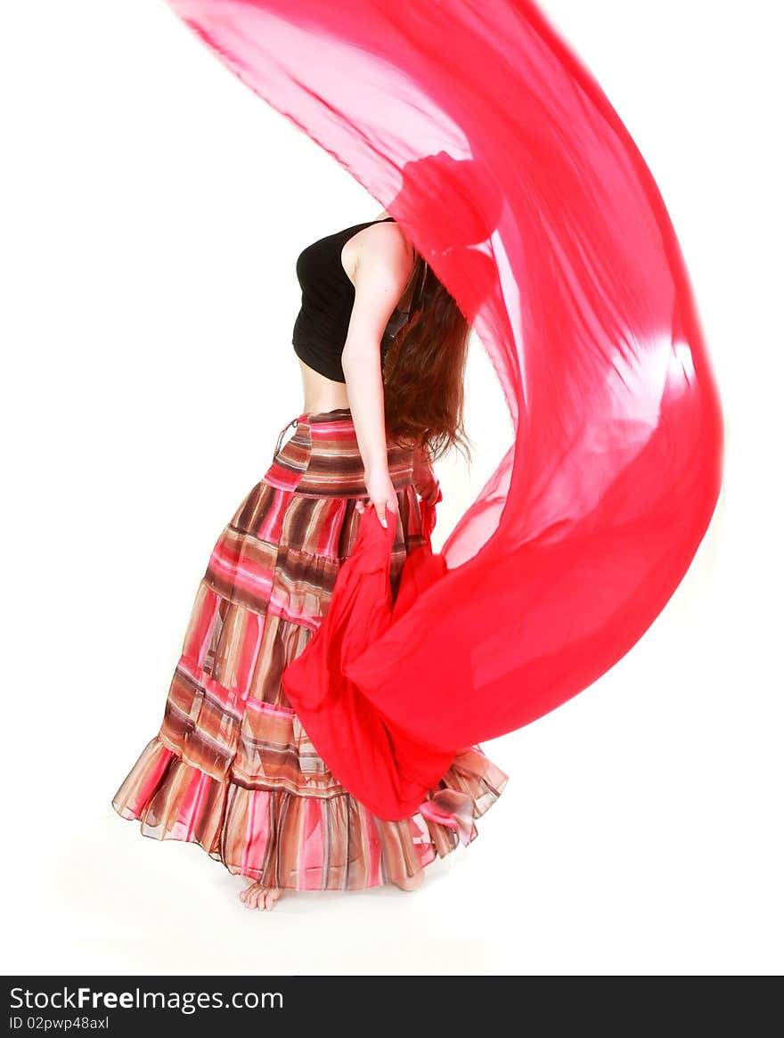 Young girl dancing with red scarf