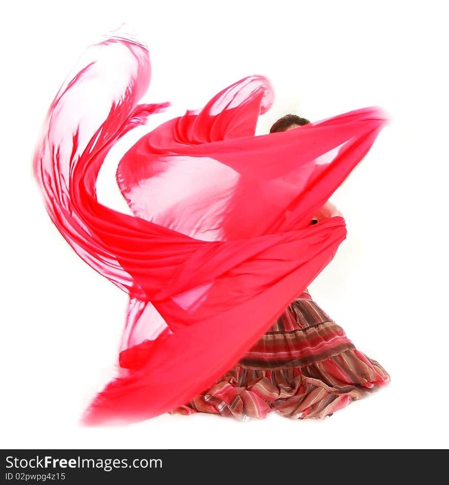 Young girl dancing with red scarf