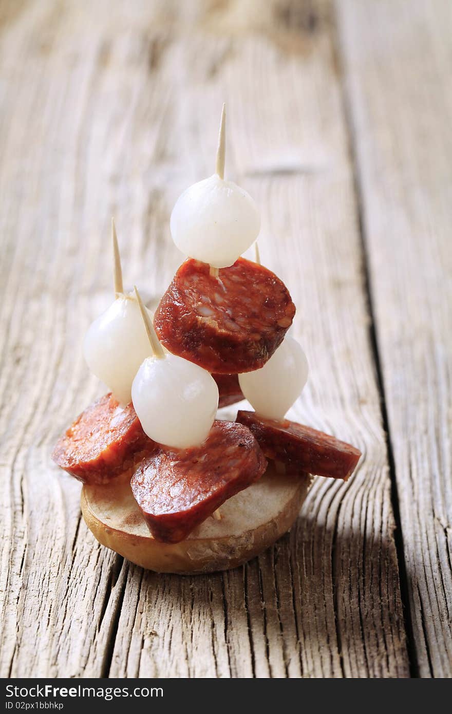 Party food - Kielbasa and onion canapes. Party food - Kielbasa and onion canapes