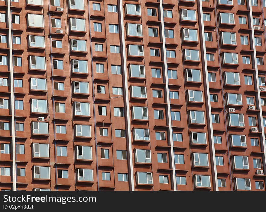 The numerous windows on the building. The numerous windows on the building.