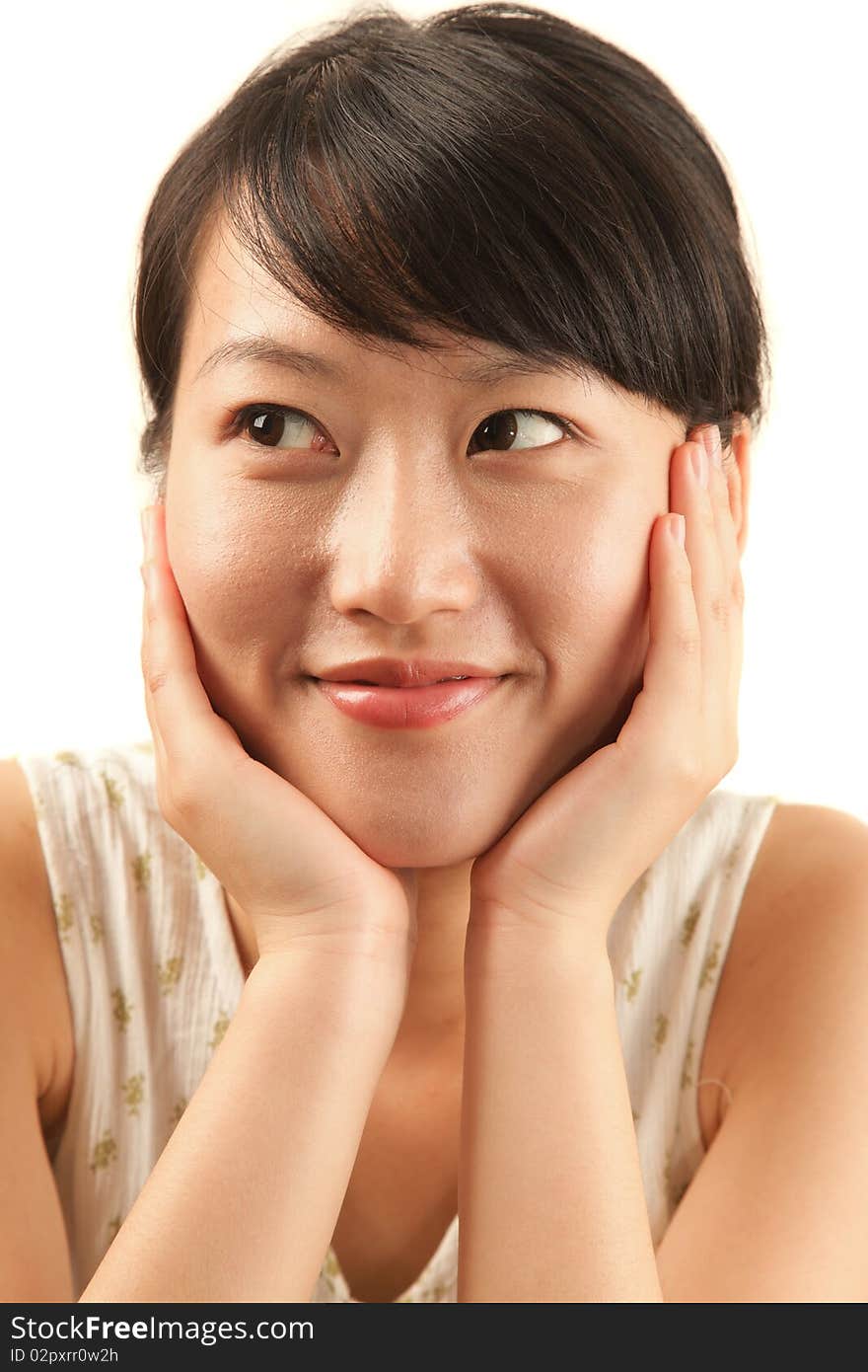 Portrait of young beautiful woman looking up