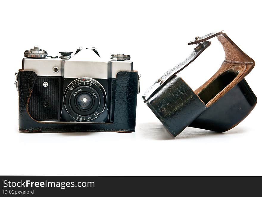 Old manual film camera and bag isolated on white background. Old manual film camera and bag isolated on white background