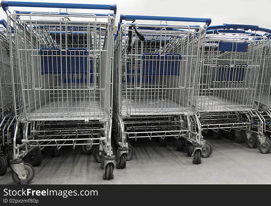 The image of shopping trolleys stands at the supermarket