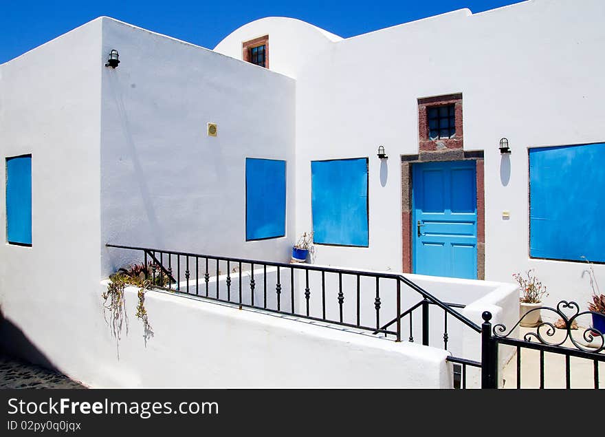 House with blue windows and blue door. House with blue windows and blue door