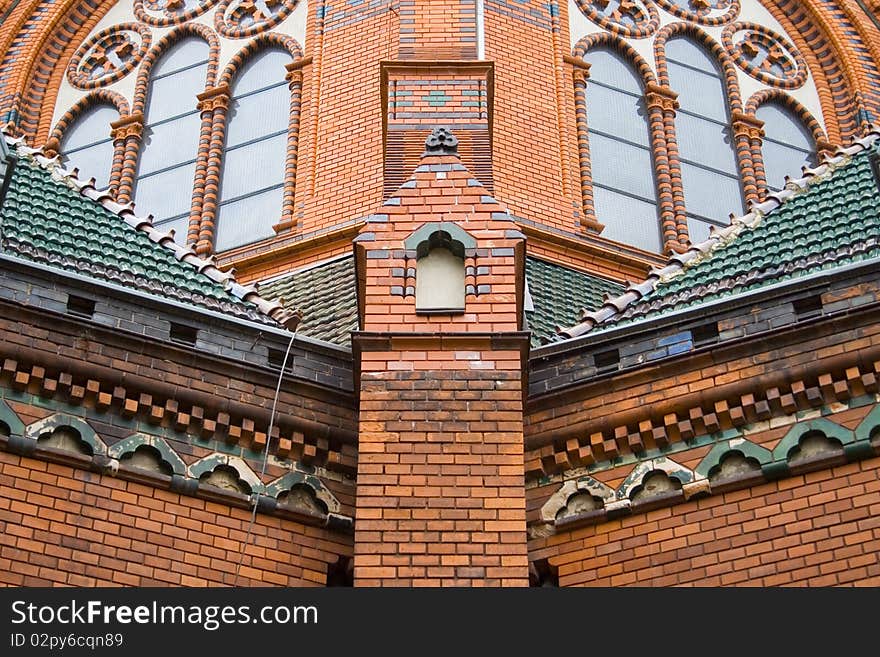 Red Bricks Church, brick wall, design windows, old building in Czech Republic, Breclav