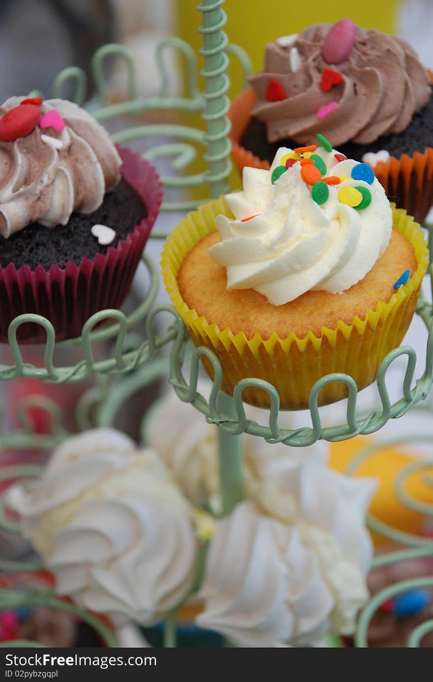 Chocolate cupcakes icing with confetti