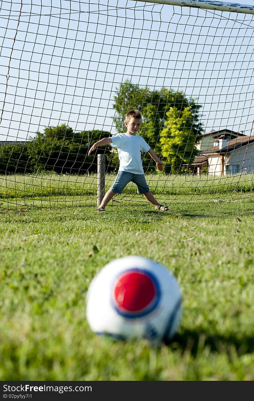 Little Goalkeeper In Action