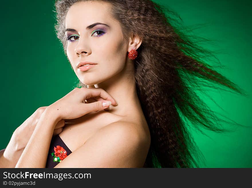 Beautiful woman on green background