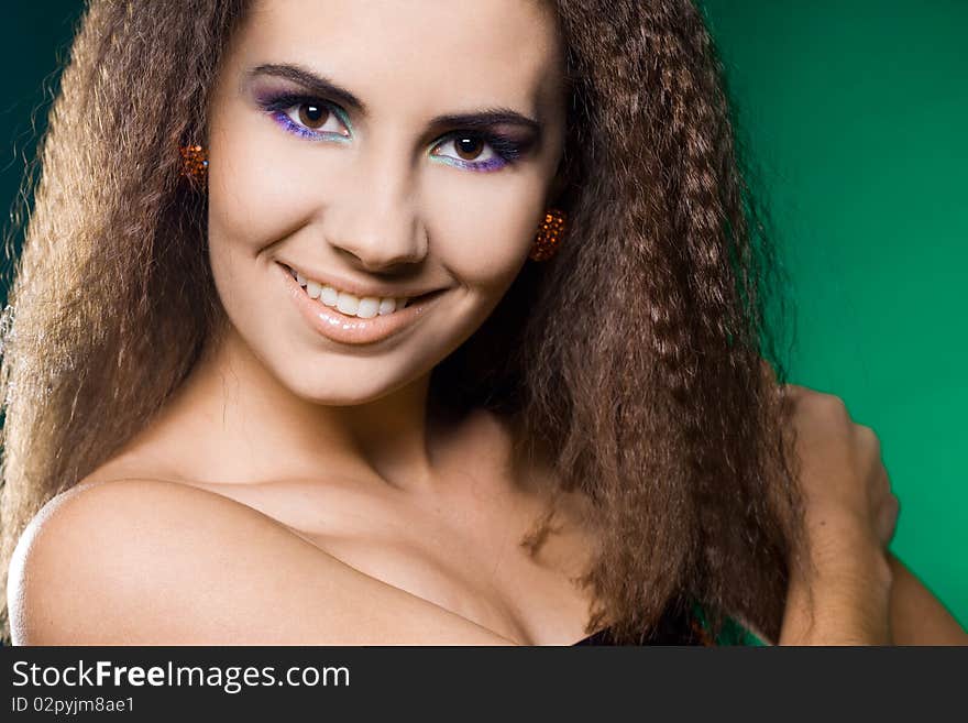 Beautiful woman on green background