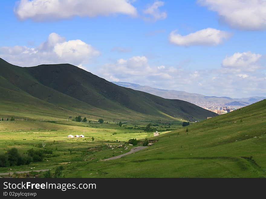 Green valley between two hills