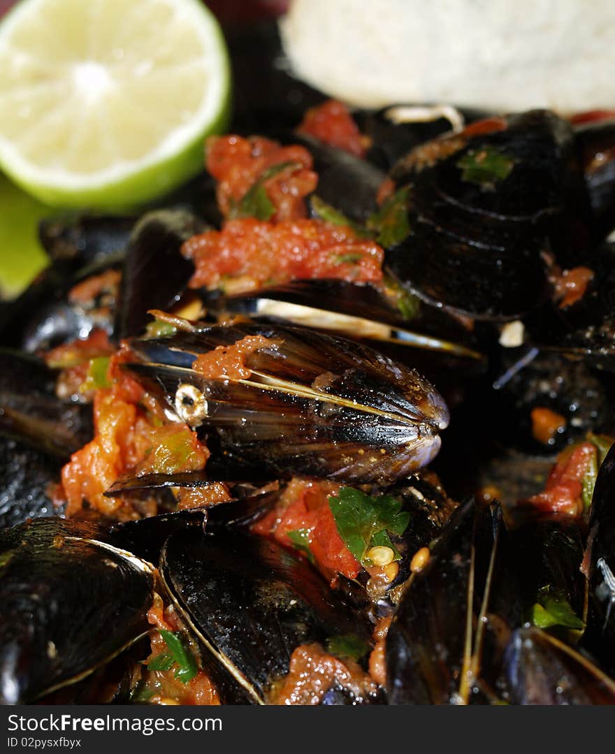 Boiled shellfish with a half lemon