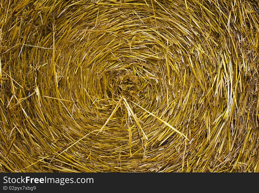 Closeup of a circular straw bale for background usage