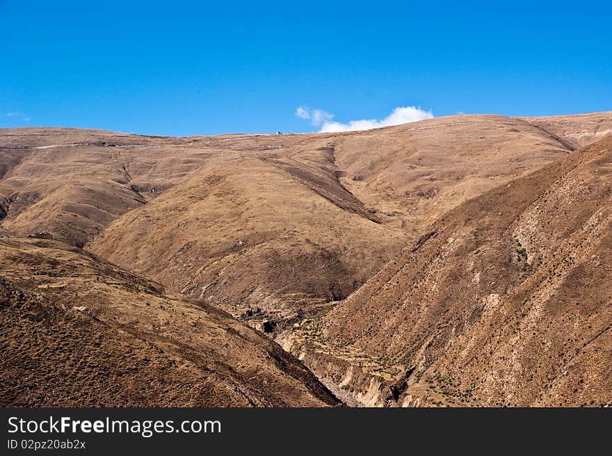 Yellowish mountain road view in tibet of China